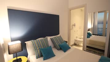 Premium bedding, free minibar items, in-room safe, desk
