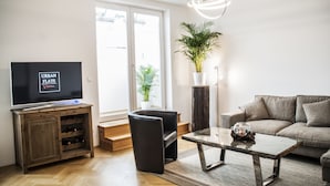 Comfort Penthouse, 3 Bedrooms, Terrace (Getreidemarkt) | Living room | Flat-screen TV, pay movies - Urban Flats Vienna City Center (Vienna)
