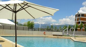 Seasonal outdoor pool, sun loungers