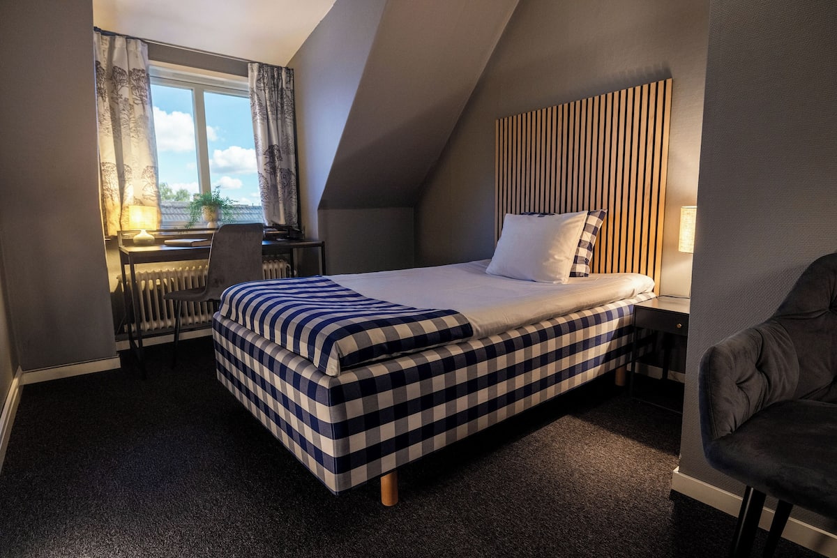 Basic Single Room | Premium bedding, desk, laptop workspace, iron/ironing board