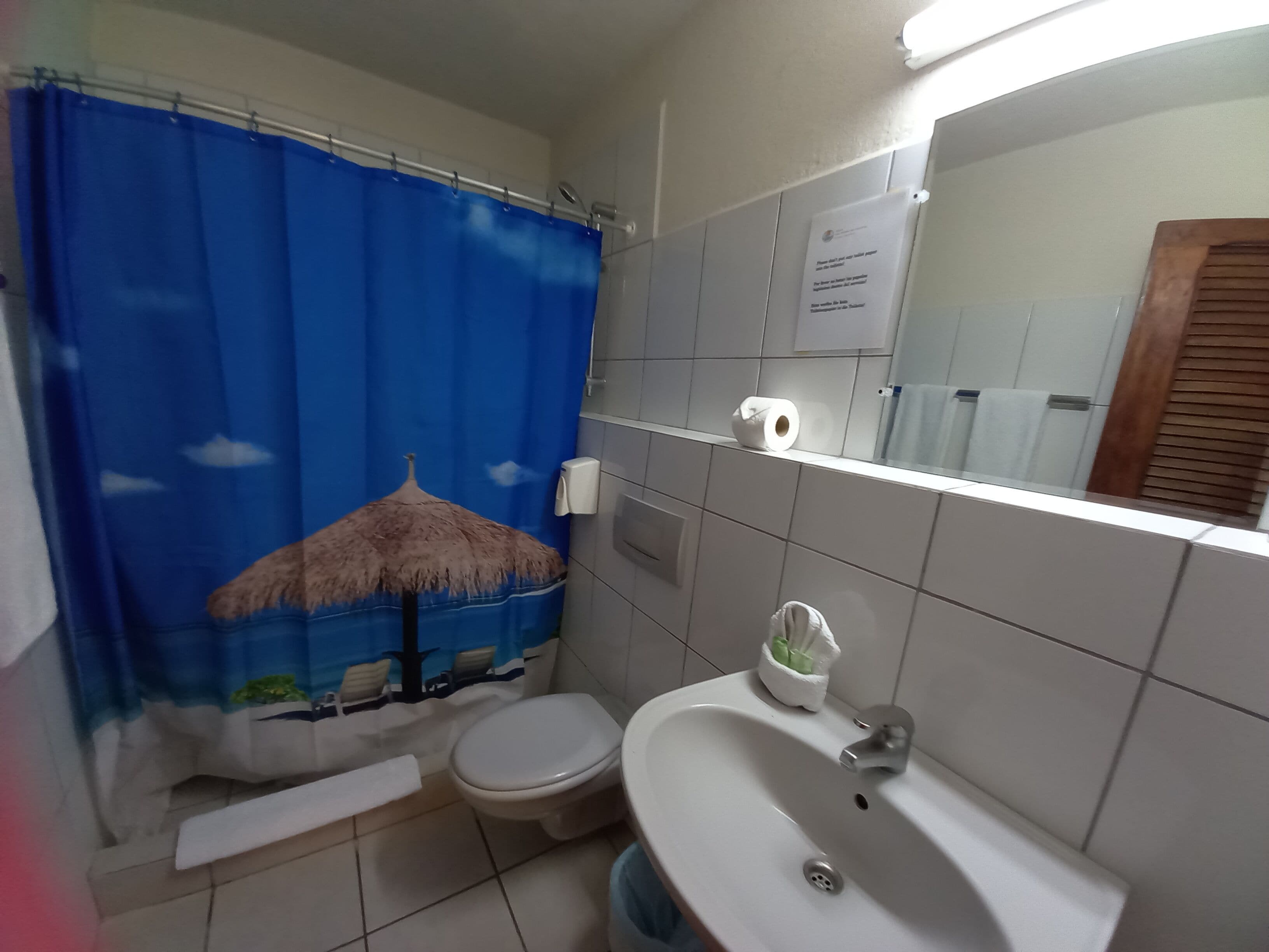 room, 2 double beds, pool view | bathroom | shower, towels