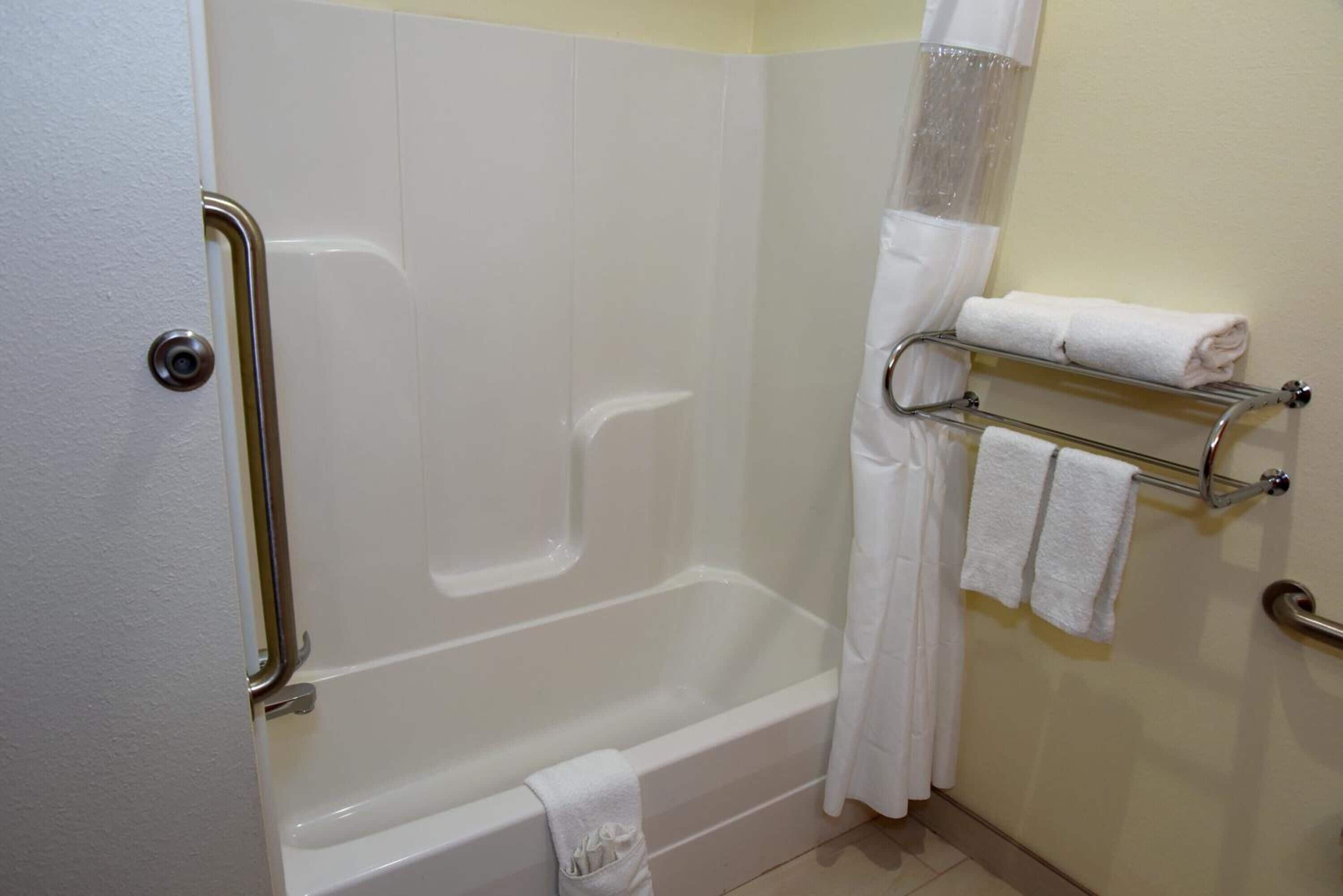 combined shower/bathtub, free toiletries, hair dryer, towels