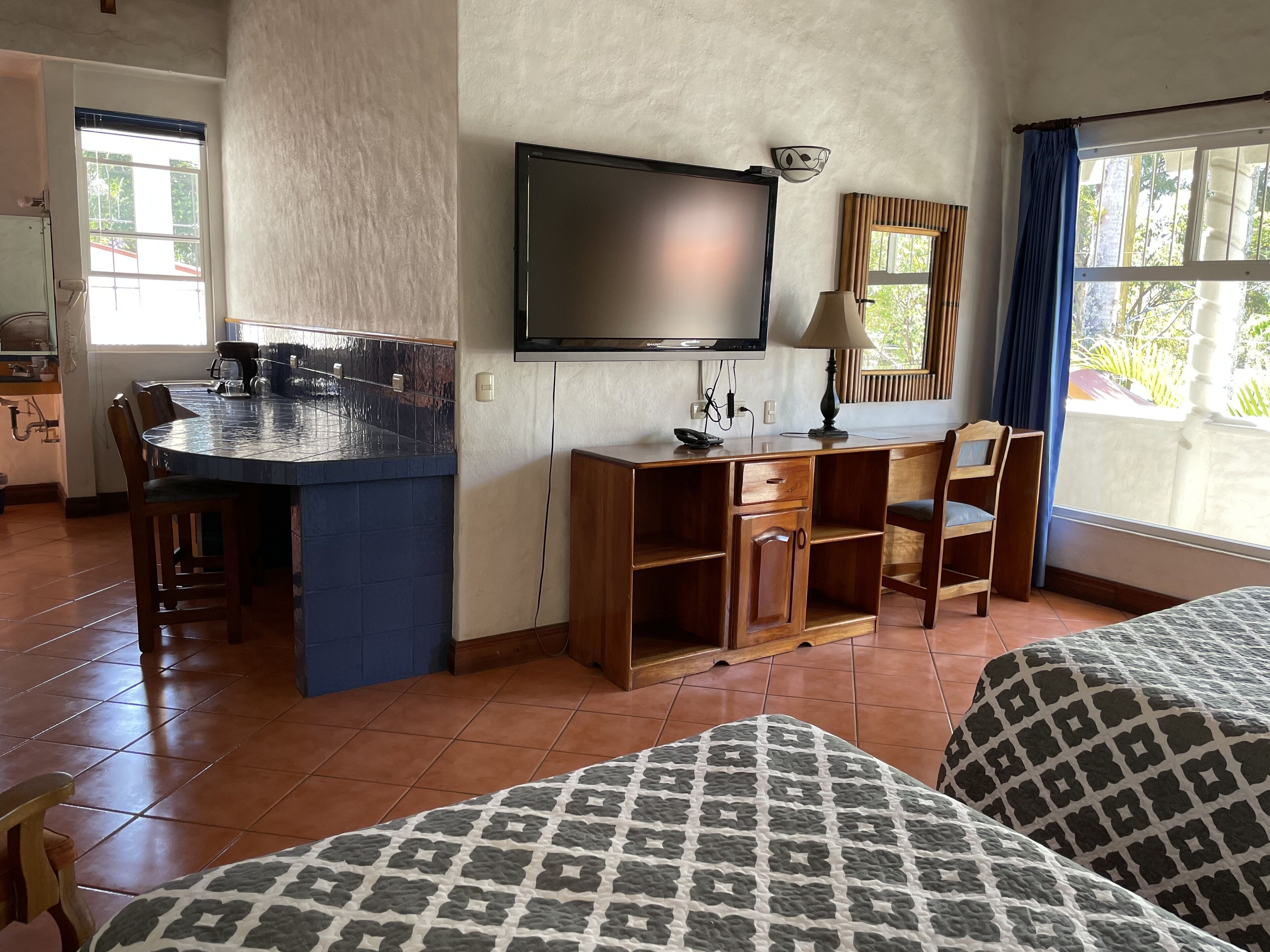 superior room, 2 double beds, private bathroom | in-room safe, individually decorated, individually furnished, desk