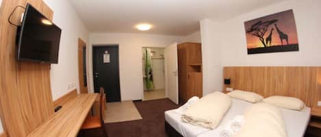 Premium bedding, desk, blackout drapes, soundproofing
