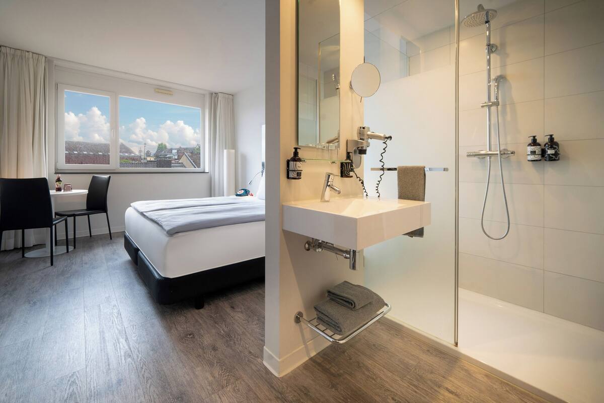 the innside room | bathroom | shower, rainfall showerhead, eco-friendly toiletries, hair dryer