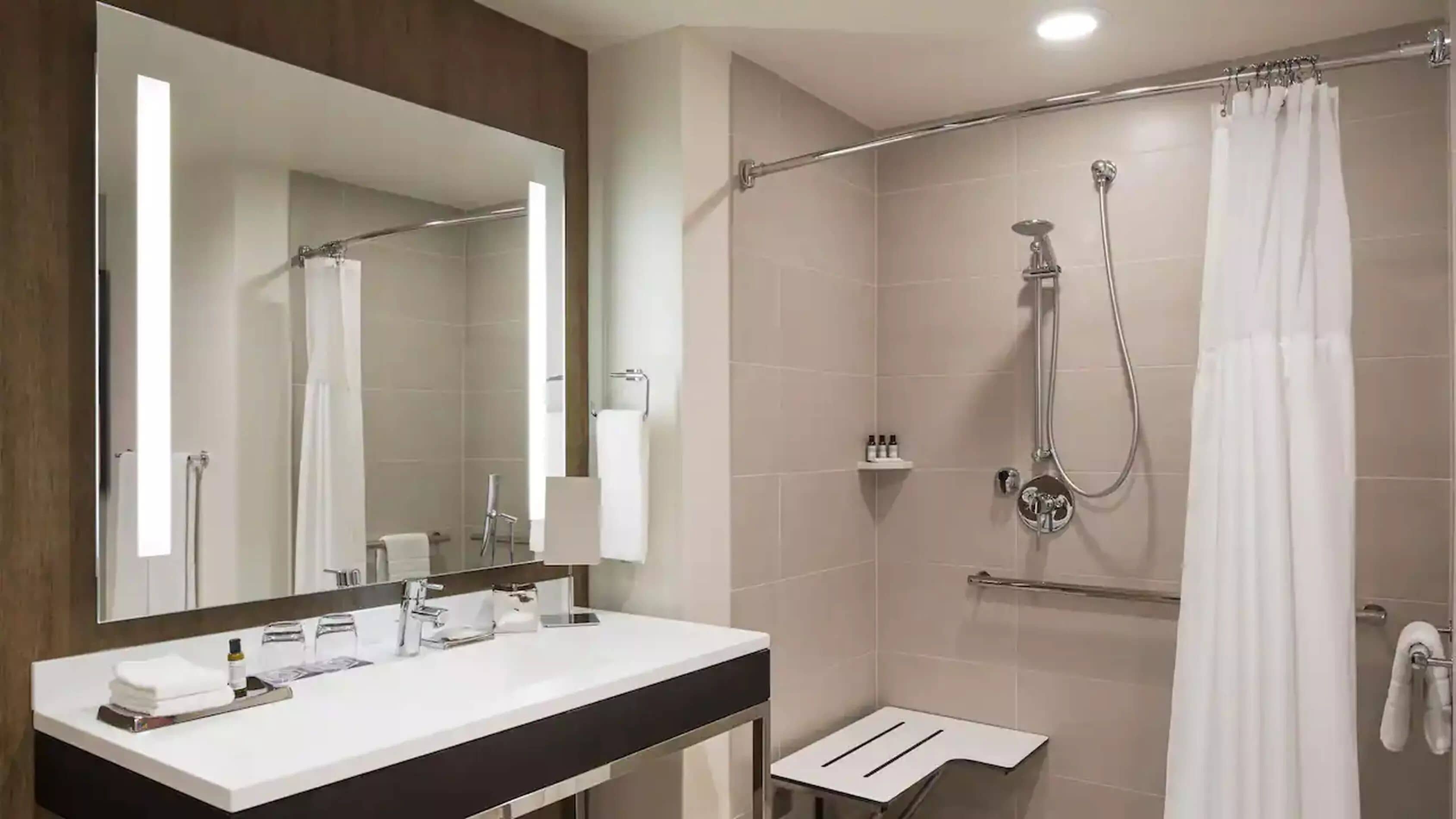 shower, free toiletries, hair dryer, towels