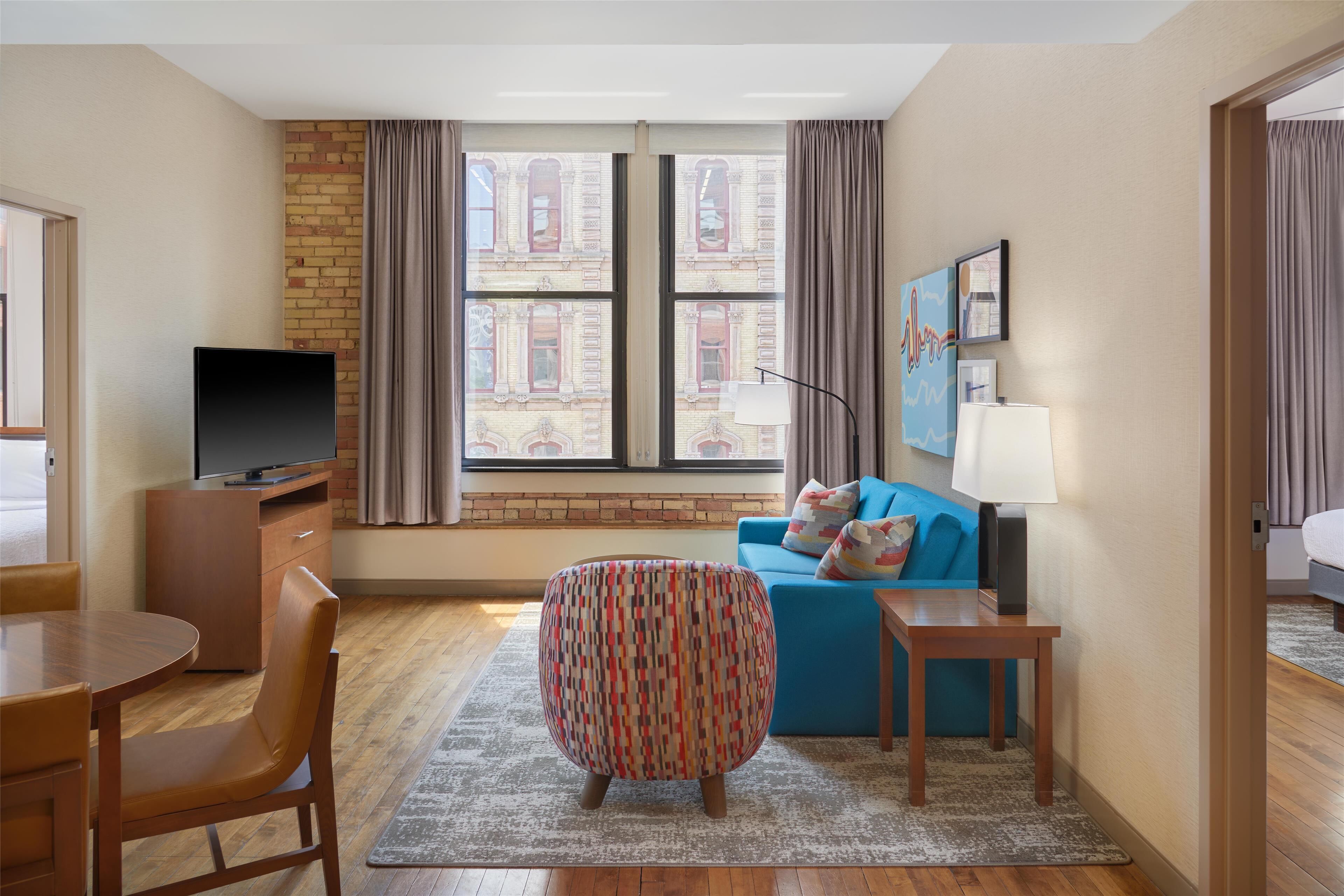 suite, 2 bedrooms, non smoking, city view | living area | 39-inch flat-screen tv with satellite channels, tv