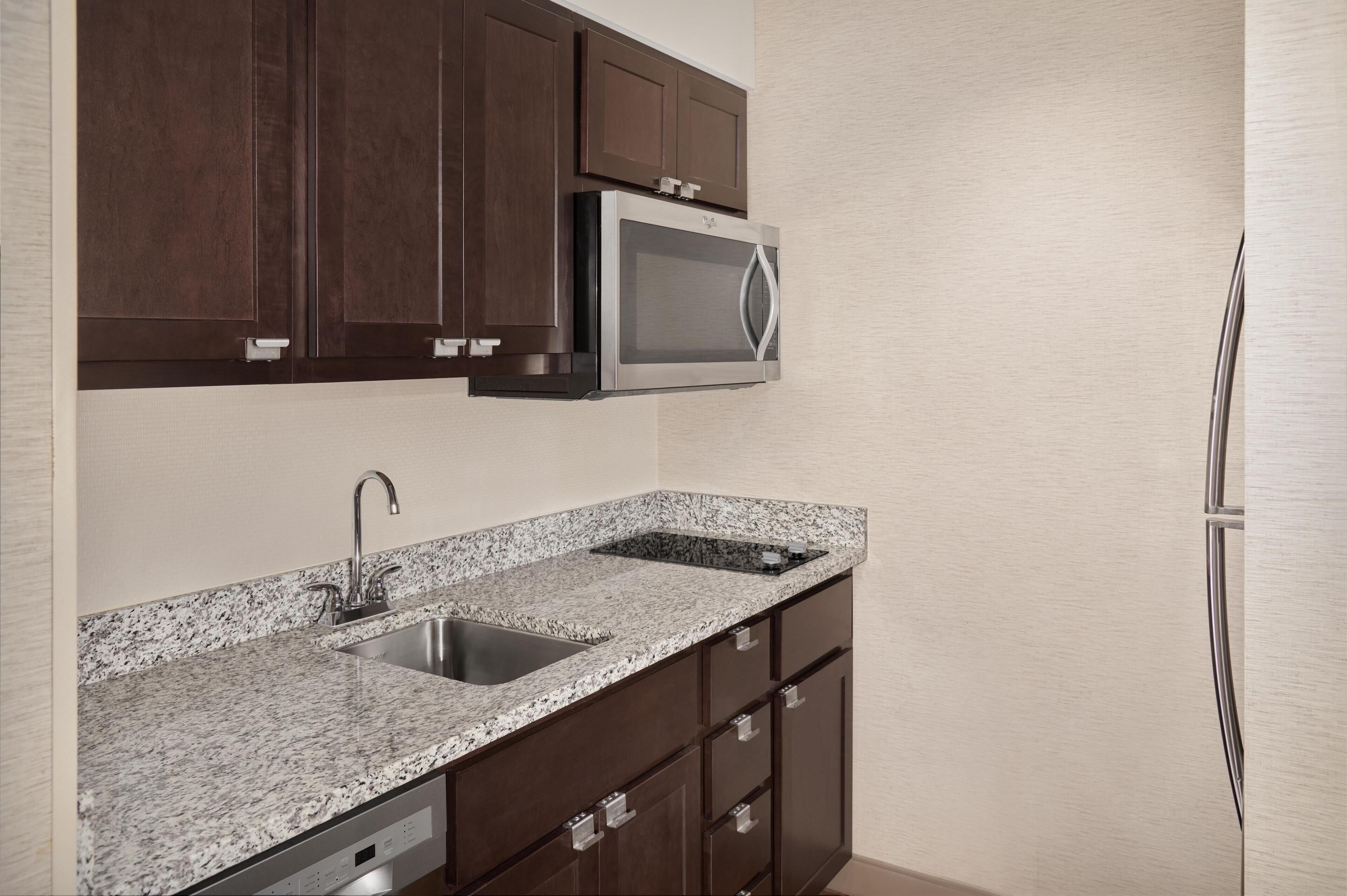 suite, 2 queen beds, non smoking, city view | private kitchen | full-sized fridge, microwave, stovetop, dishwasher