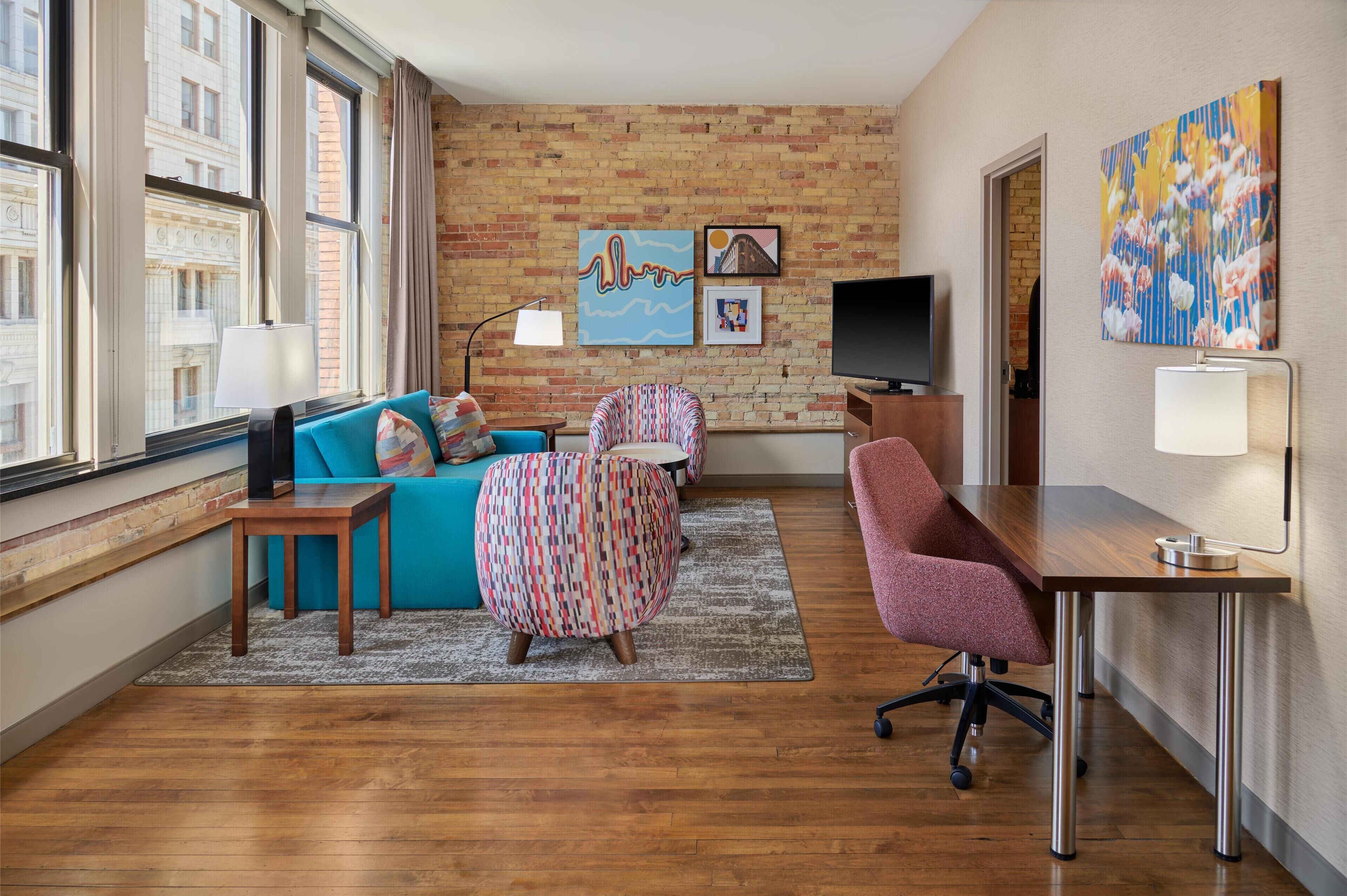 suite, 1 king bed, non smoking, city view | in-room safe, desk, blackout curtains, iron/ironing board