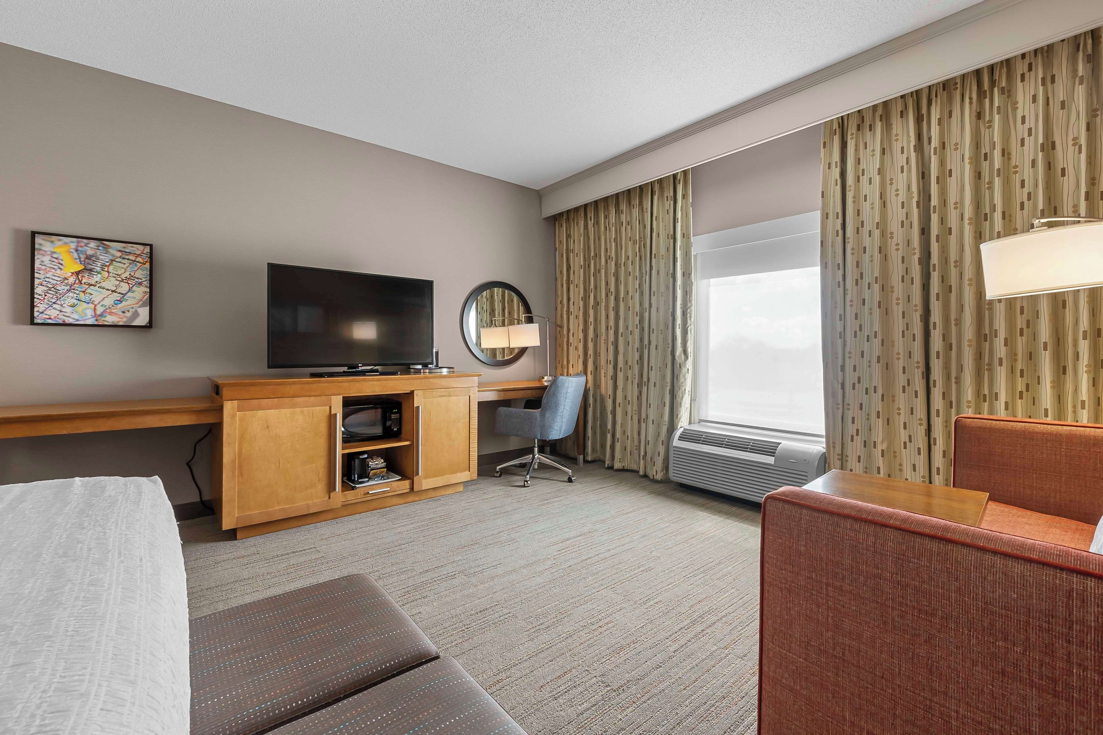 room, 1 king bed with sofa bed, non smoking, refrigerator & microwave | in-room safe, desk, iron/ironing board, free cots/infant beds