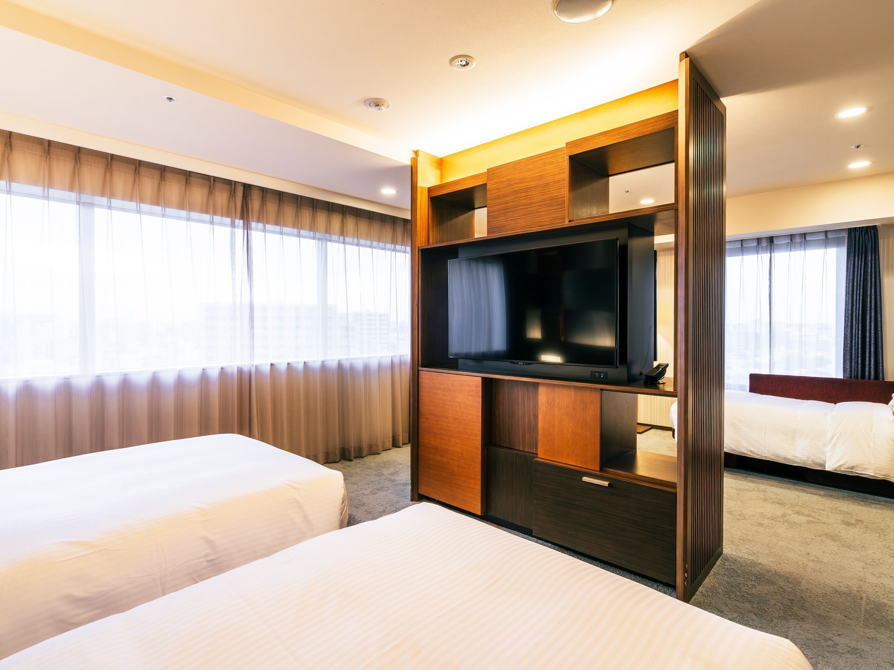 Chambre « Premier » avec lits jumeaux, non-fumeurs (Extra beds based on no. of adults) | Literie de qualité supérieure, couette en duvet d'oie