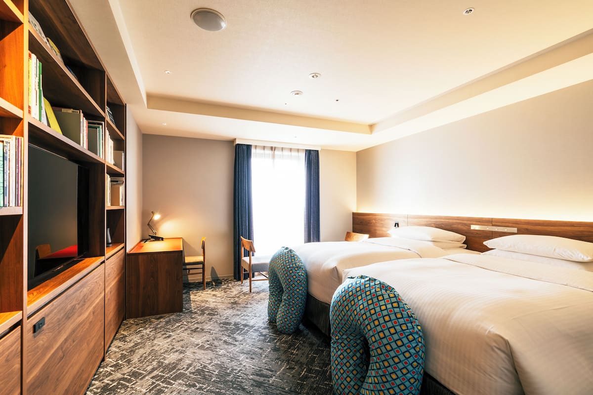 Luxe beddengoed, donsdekens, een kluis op de kamer