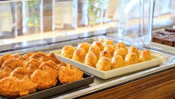 A bakery display case with pastries.
