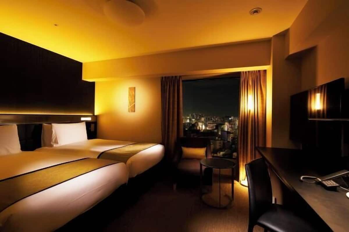 Premium bedding, down duvets, in-room safe, desk