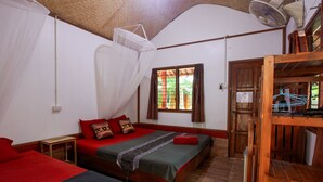 A room with two beds, a wooden ceiling, a window with curtains, and a fan. - Family Song Bungalow (Koh Lipe)
