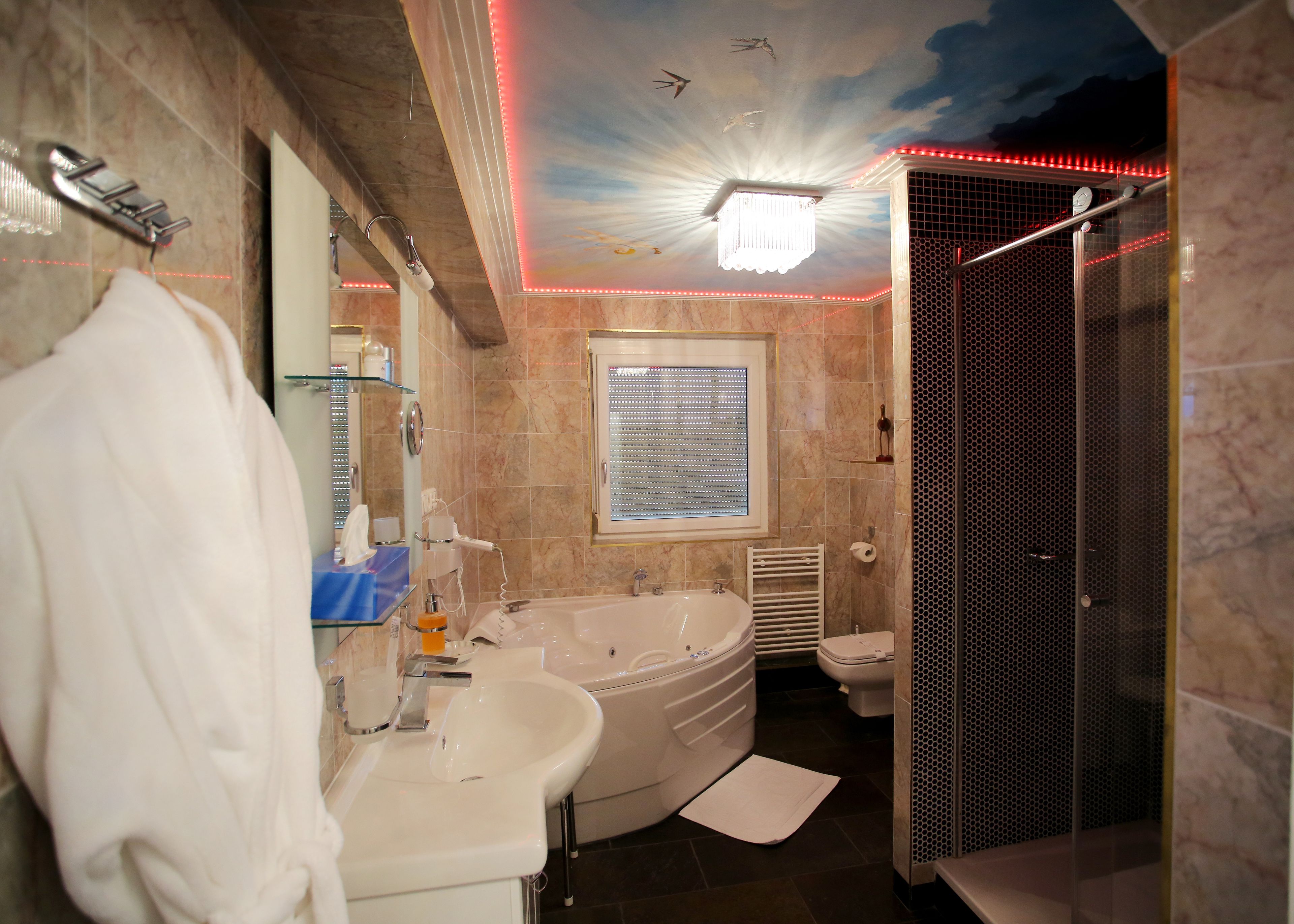 suite | bathroom amenities | free toiletries, hair dryer, bathrobes, slippers