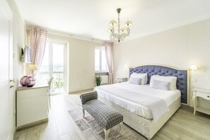 Suite, Balcony | Minibar, in-room safe, desk, free WiFi