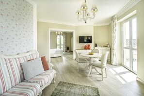 Suite, 1 King Bed, Jetted Tub, Hill View | Living area | Flat-screen TV - Locanda Borgo Vecchio (Neive)
