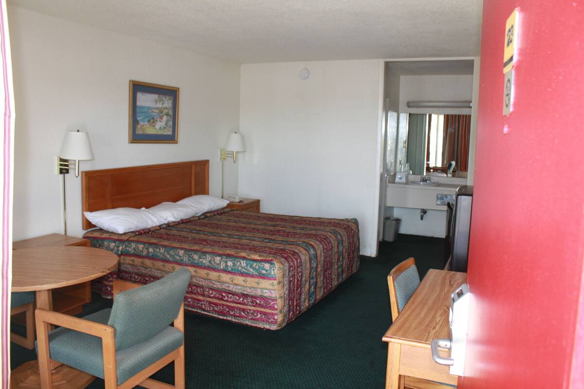 Quarto standard, 1 cama King | Escrivaninha, camas extras/dobráveis, Wi-Fi de cortesia