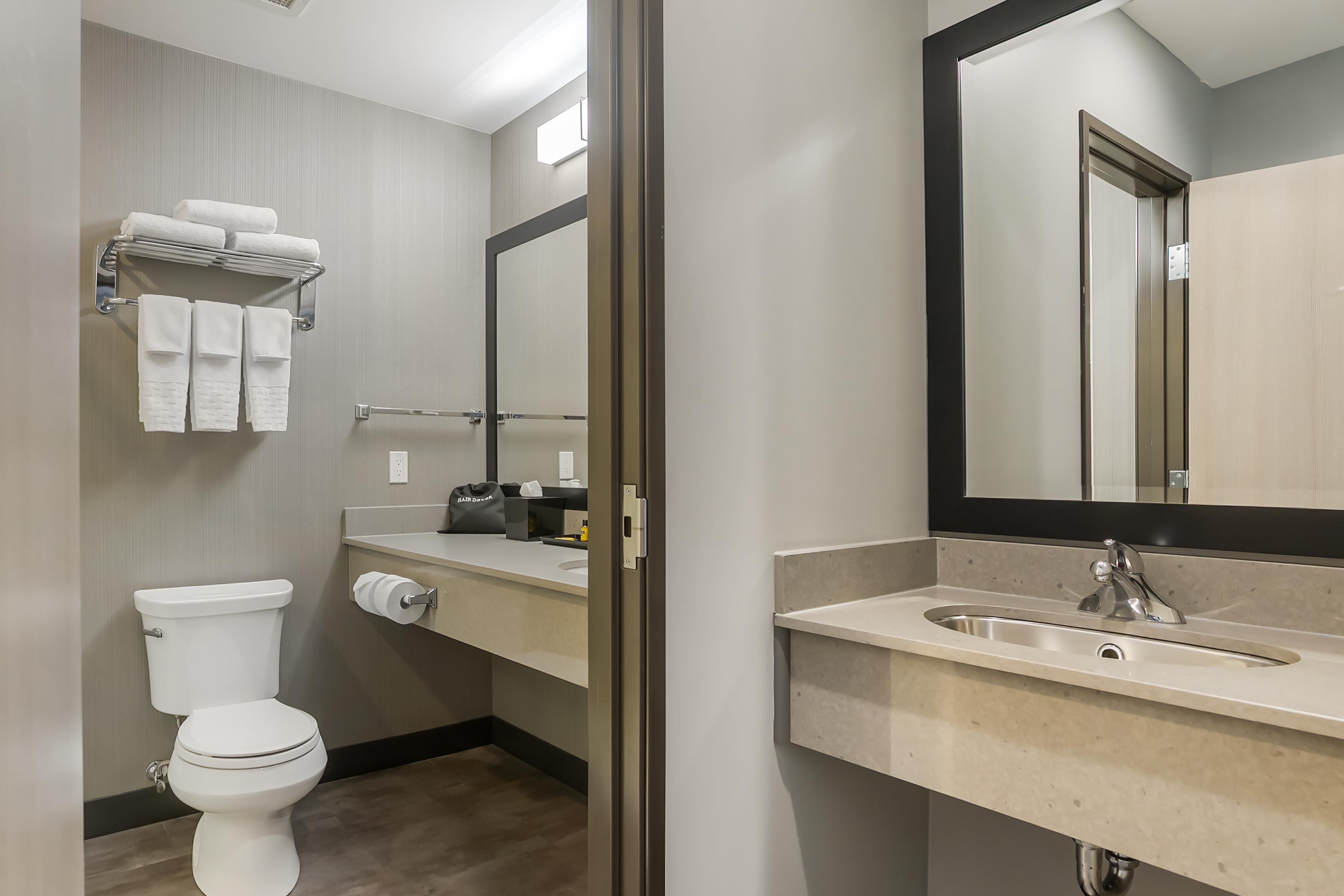 standard room, 2 queen beds, non smoking (shower only) | bathroom | free toiletries, hair dryer, towels