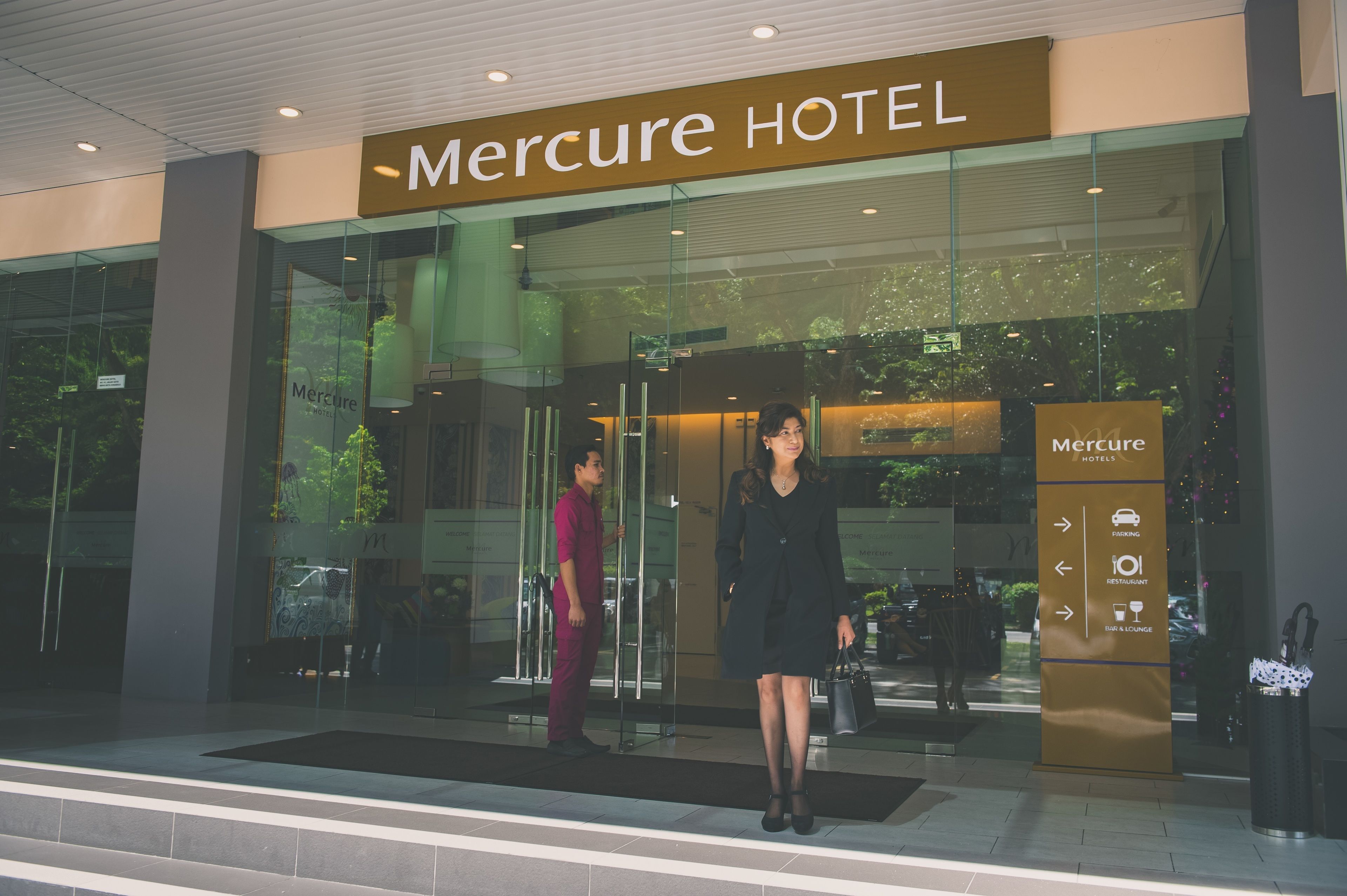 The exterior of the Mercure Hotel with a clear sign indicating the hotel's name.