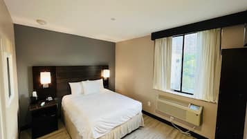 Habitación estándar, 1 cama Queen size | Insonorización, internet, ropa de cama y despertador