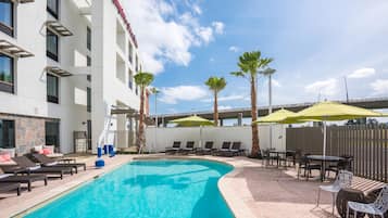 Outdoor pool, open 10:00 AM to 10:00 PM, sun loungers