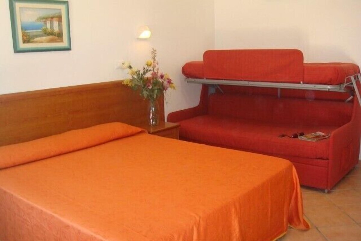 Quarto triplo | Escrivaninha, berços (sobretaxa), Wi-Fi de cortesia