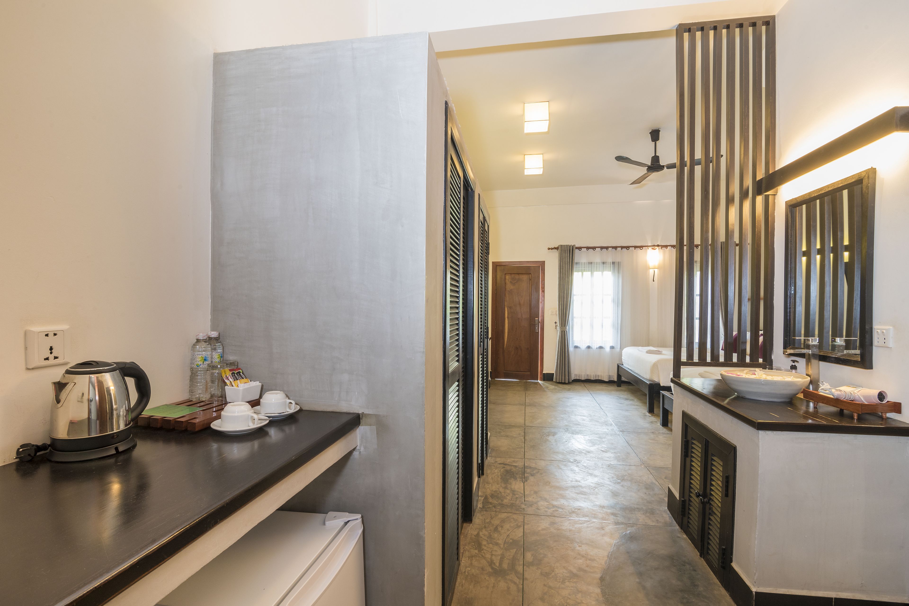 deluxe family suite room - free roundtrip transfer | minibar, in-room safe, desk, iron/ironing board