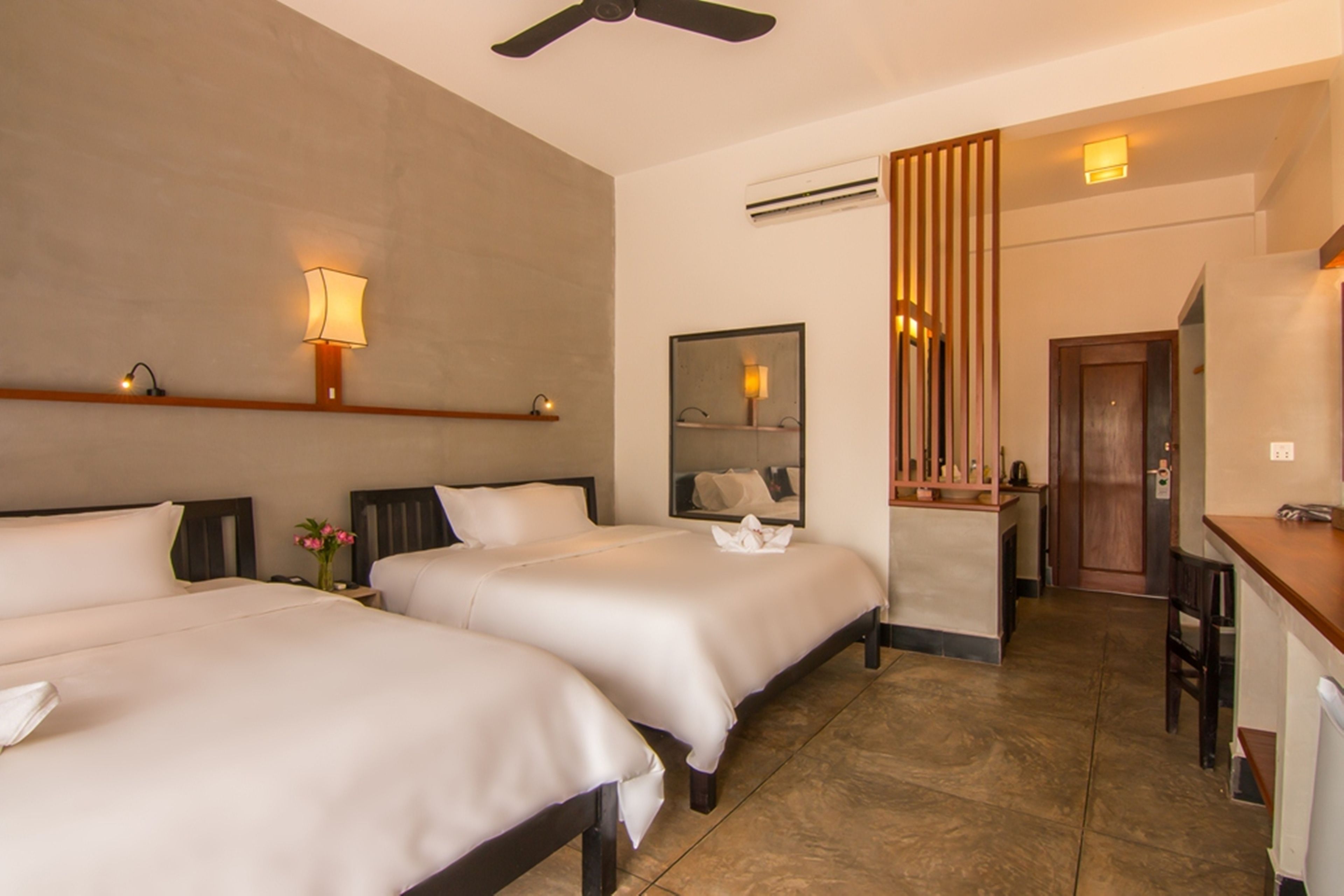 deluxe twin room - free pick up | bathroom | separate bathtub and shower, free toiletries, hair dryer, slippers