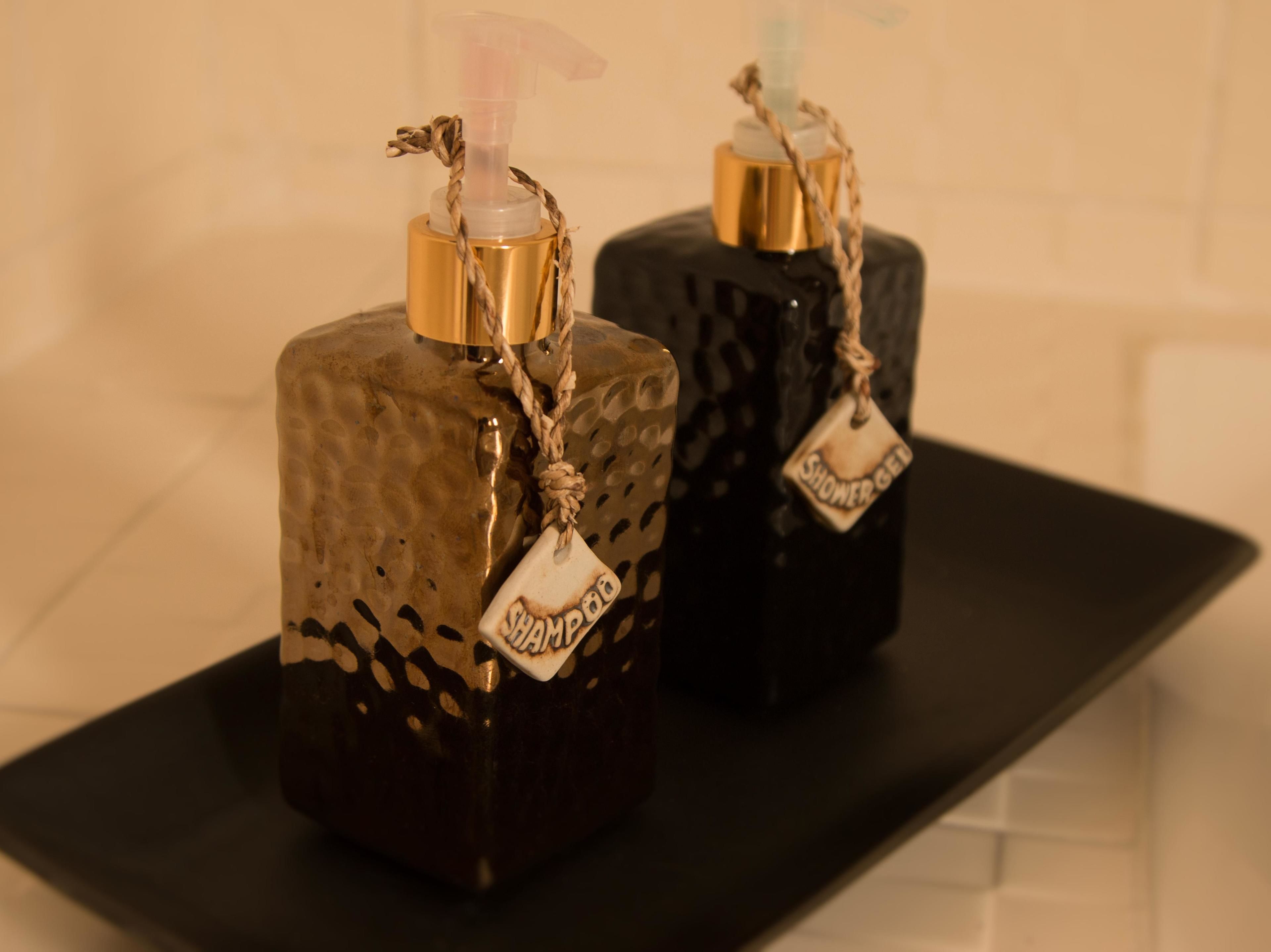 deluxe room | minibar, in-room safe, desk, laptop workspace