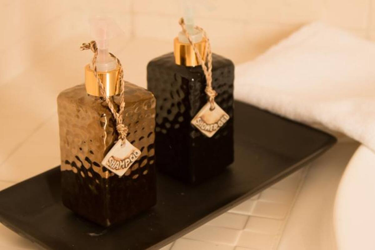 separate bathtub and shower, deep-soaking bathtub, rainfall showerhead