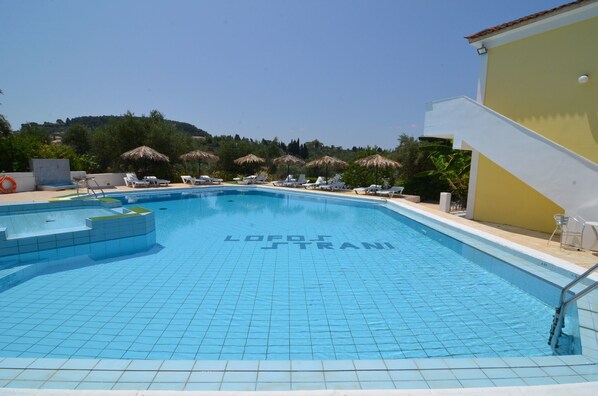 Seasonal outdoor pool, open 8 AM to 8 PM, pool umbrellas, sun loungers