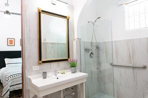 Room, 1 Queen Bed (Suite 1 ) | Bathroom | Shower, free toiletries, hair dryer, towels