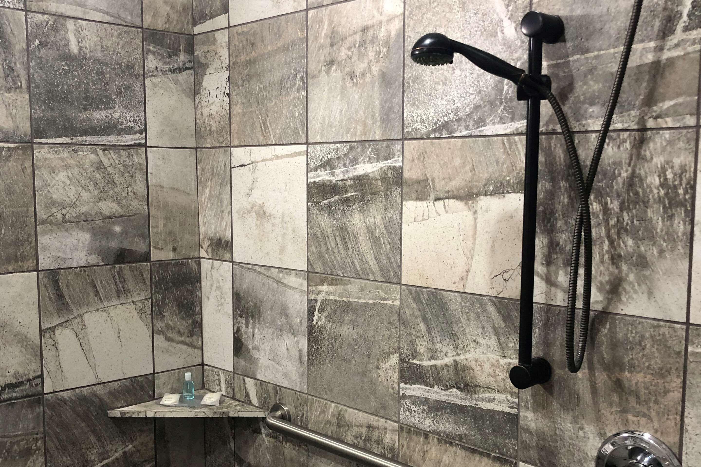 suite, 1 king bed with sofa bed, accessible, non smoking (roll-in shower, mobility & hearing) | desk, laptop workspace, blackout curtains, iron/ironing board