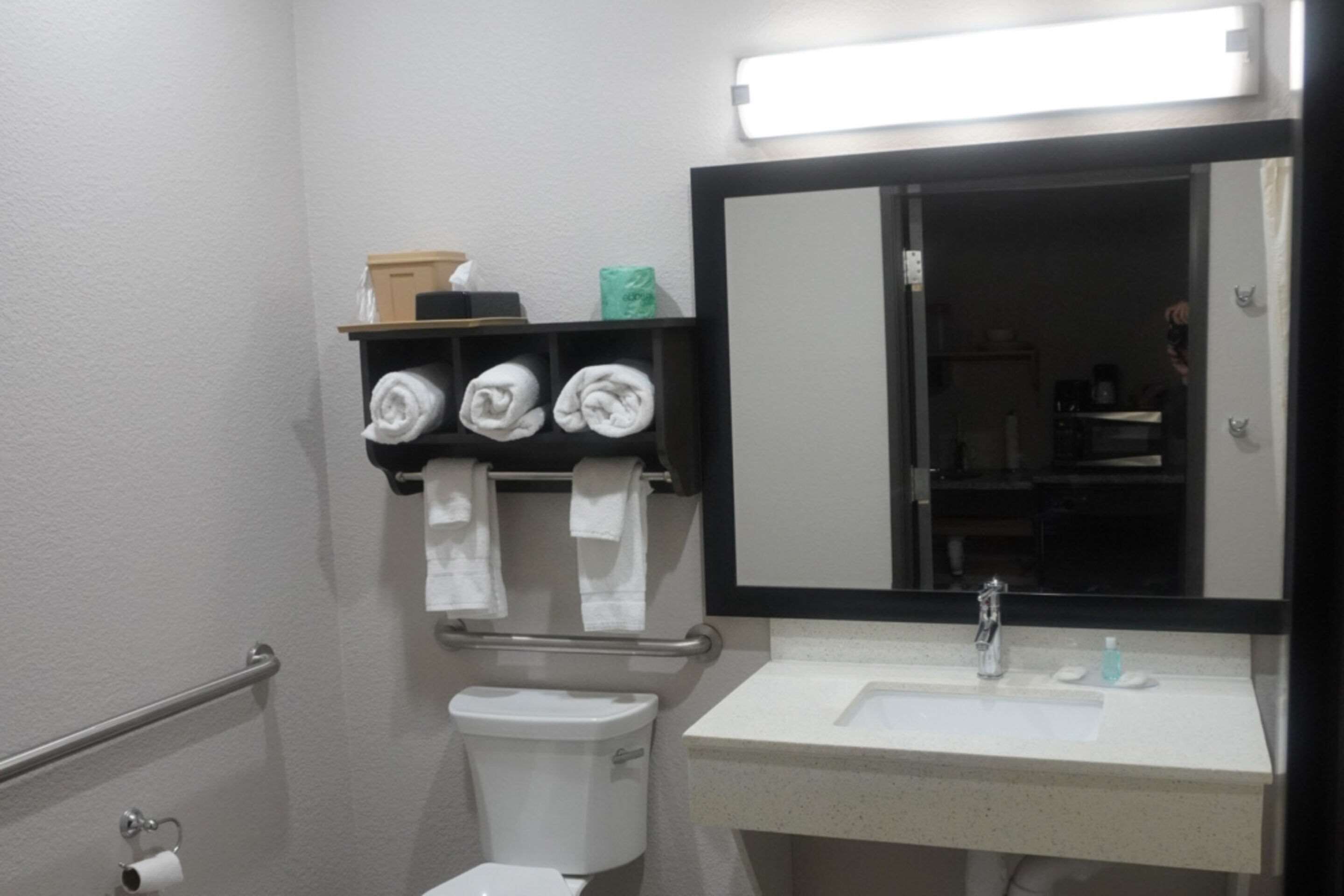 desk, laptop workspace, blackout curtains, iron/ironing board