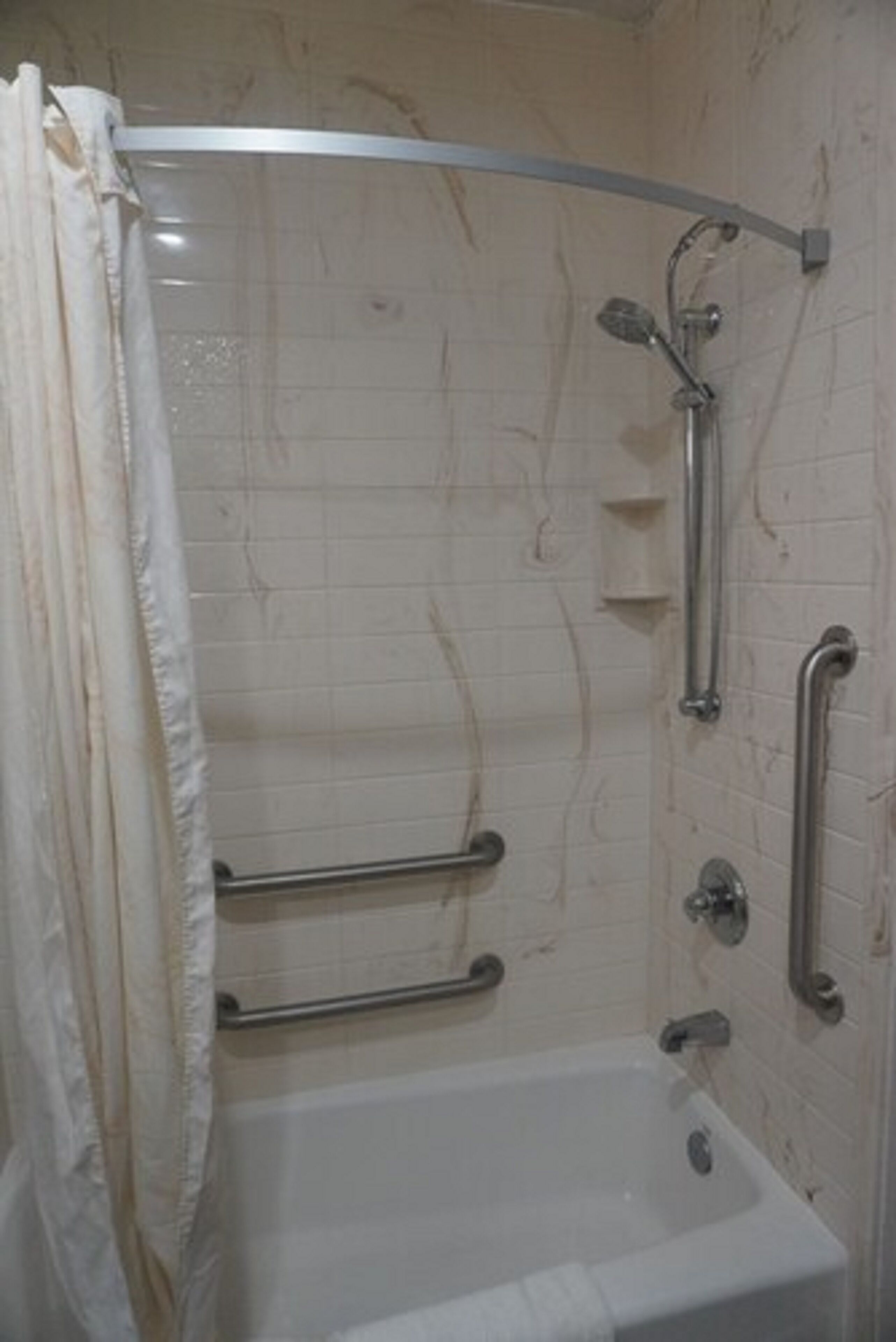 combined shower/bathtub, free toiletries, hair dryer, towels