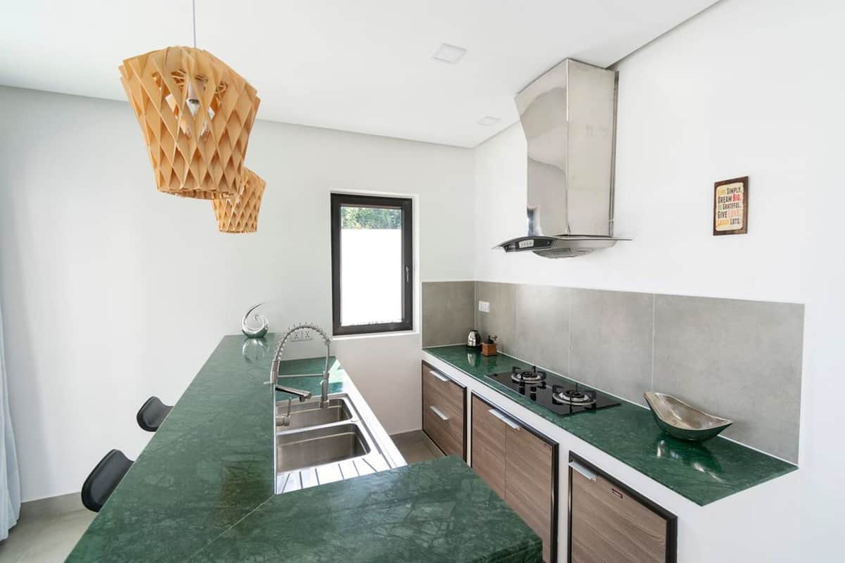 family villa with private jacuzzi (2 king beds and 4 single beds and 1 living room with sofa bed) | private kitchen | coffee/tea maker, electric kettle