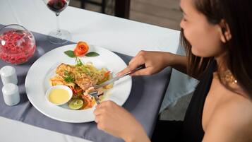Breakfast, lunch, dinner served; international cuisine, garden views