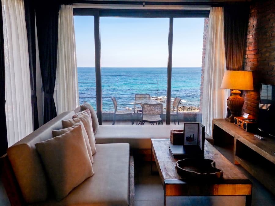 Twin Room, 2 Double Beds | Living area | Flat-screen TV