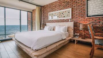 Alloggio su due livelli, 1 letto king | Una cassaforte in camera, tende oscuranti, lenzuola