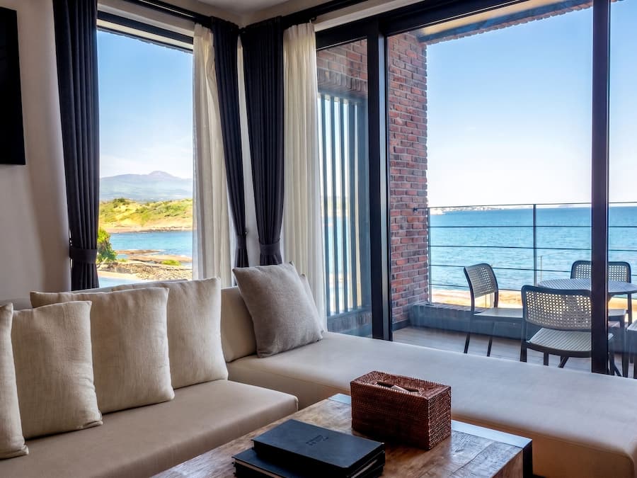 Twin Room, 2 Double Beds | Living area | Flat-screen TV