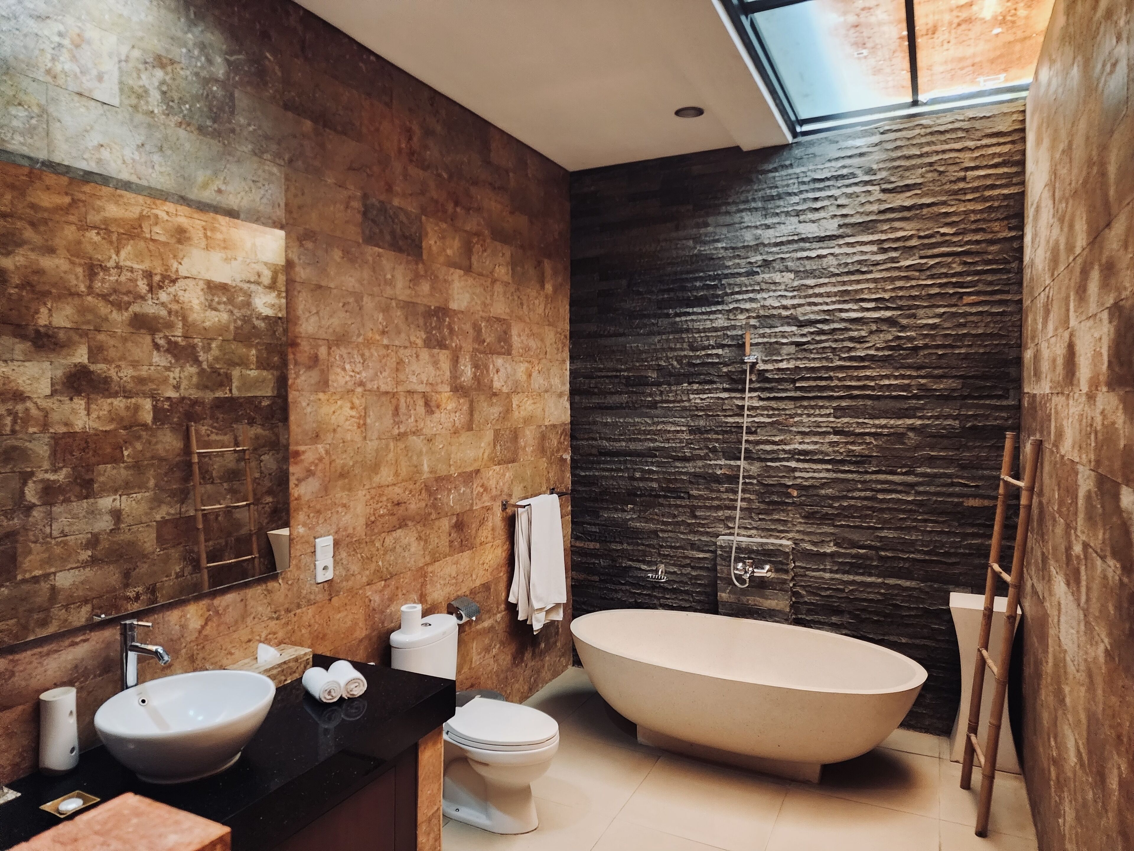 Separate bathtub and shower, rainfall showerhead, free toiletries