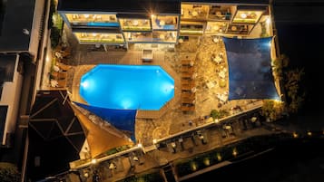 Seasonal outdoor pool, pool umbrellas, pool loungers