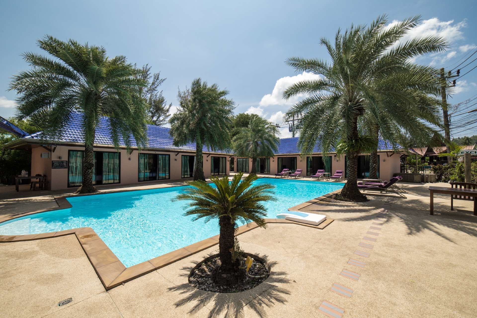 outdoor pool, pool umbrellas, pool loungers