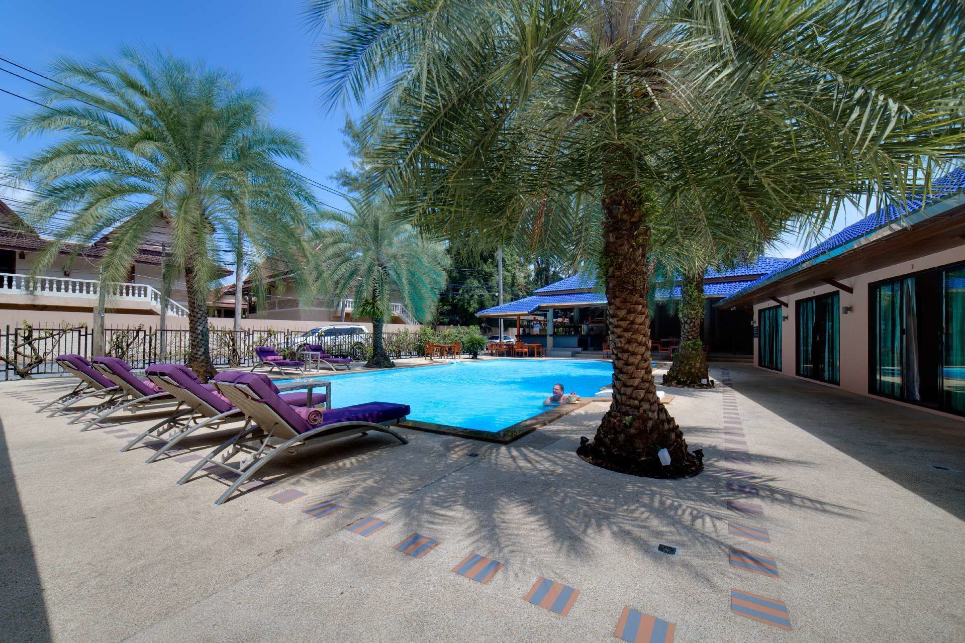 outdoor pool, pool umbrellas, pool loungers