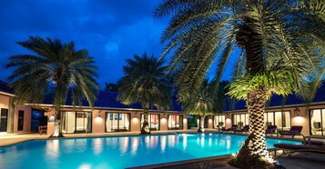 Outdoor pool, pool umbrellas, sun loungers