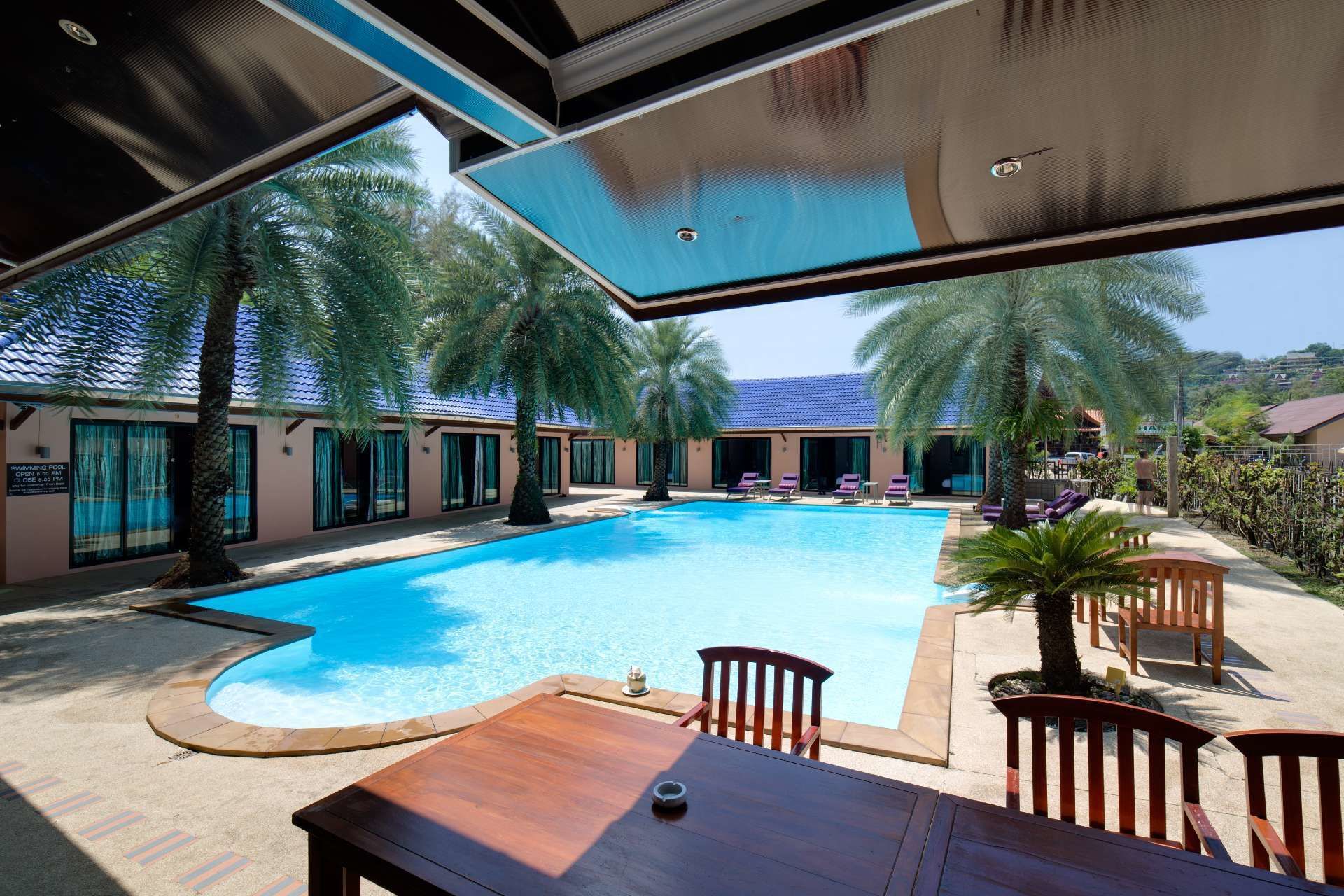 outdoor pool, pool umbrellas, pool loungers