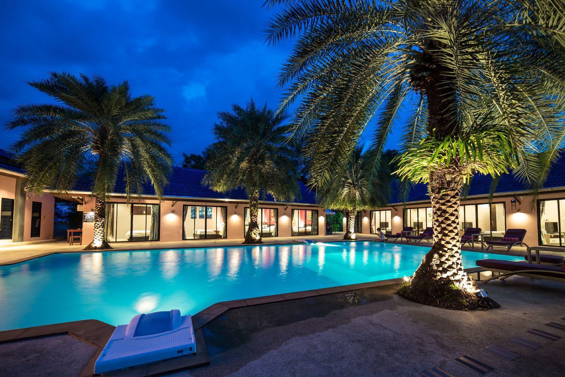 outdoor pool, pool umbrellas, pool loungers