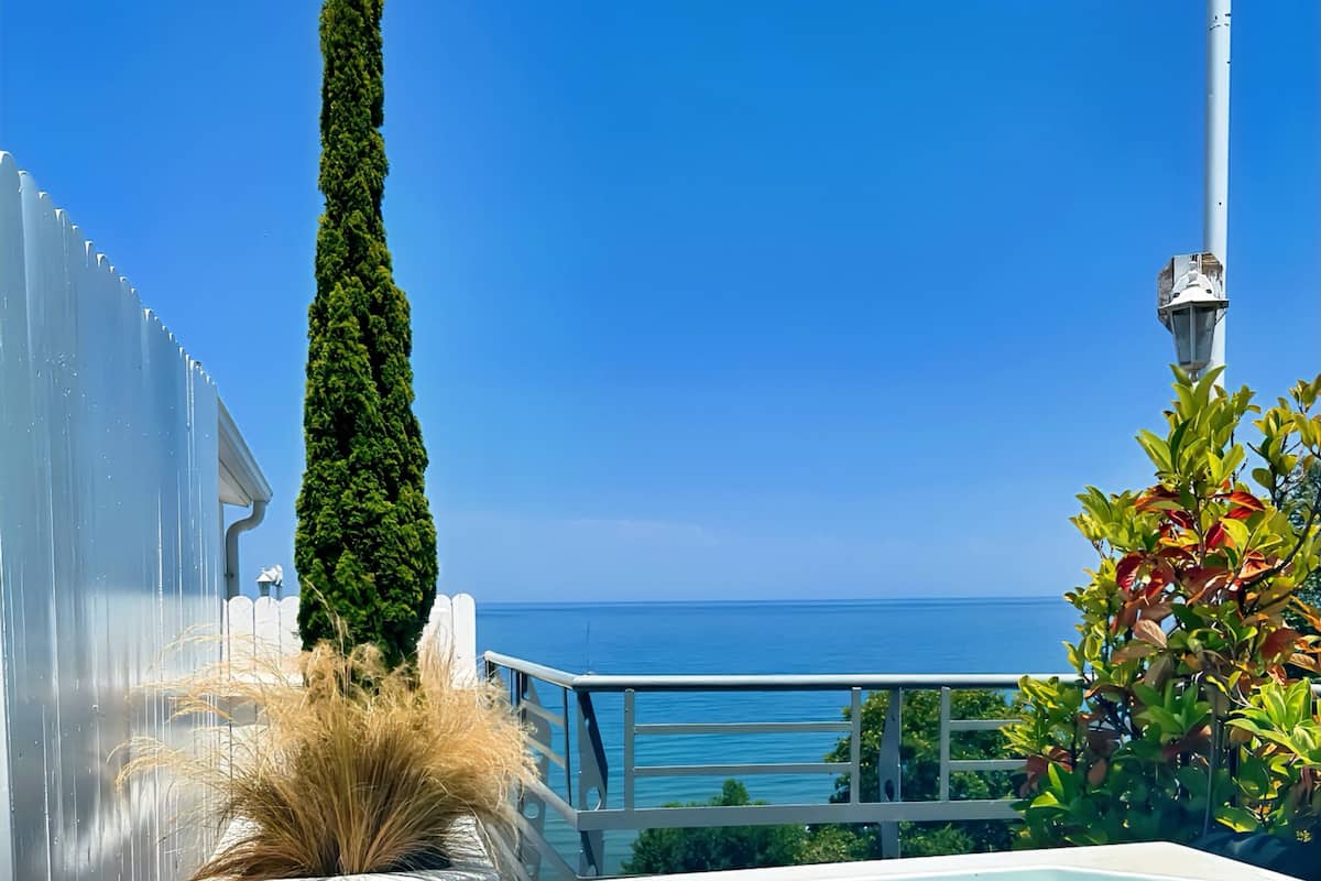 Aegean Spa Suite Sea View with Private Sauna & Rooftop Outdoor Jetted Tub | Frette Italian sheets, premium bedding, down comforters, pillowtop beds